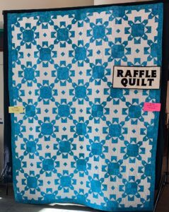 beautiful blue and white tiled quilt